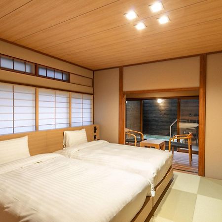 源泉掛け流しの宿albergo湯楽 Yugawara Eksteriør billede